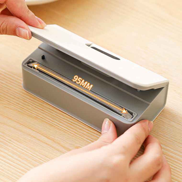 Mini scelleuse 2 en 1 rechargeable USB-C avec cutter intégré